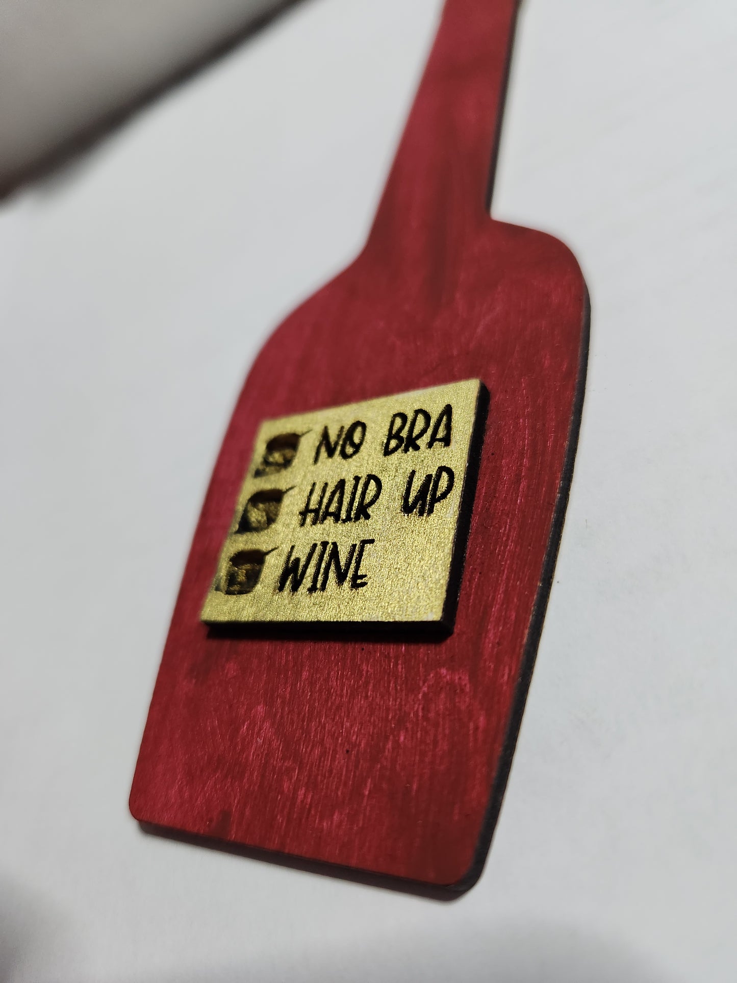 Wine tag. Check No Bra. Check Hair up. Check Wine. Wine bottle