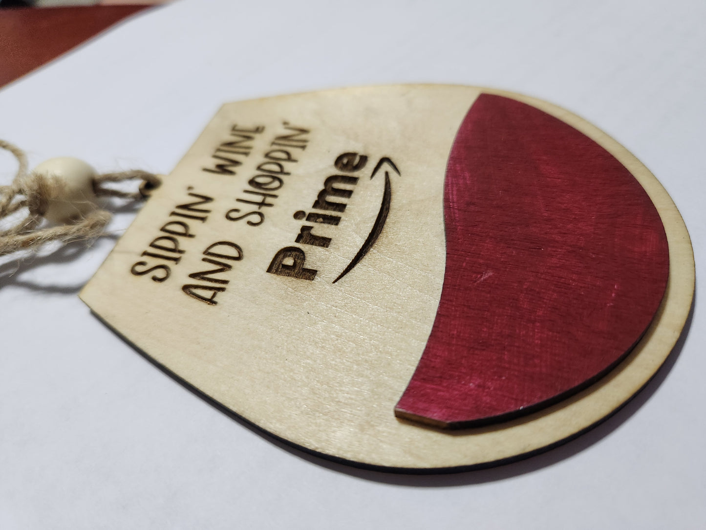 Wine tag or car charm. Sippin wine and shoppin Prime. Red Wine glass