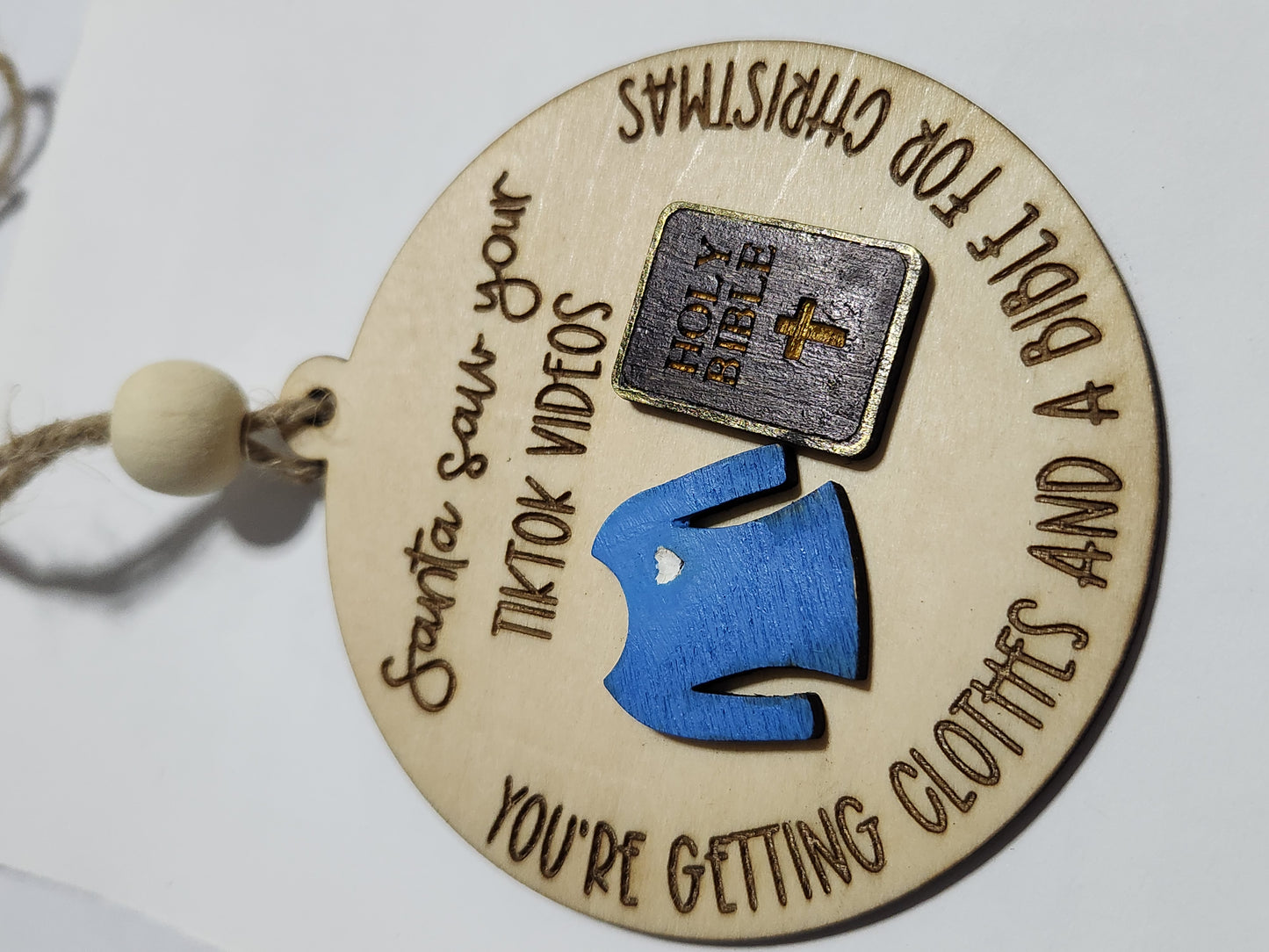 Ornament or car charm.  Santa saw your tiktok videos