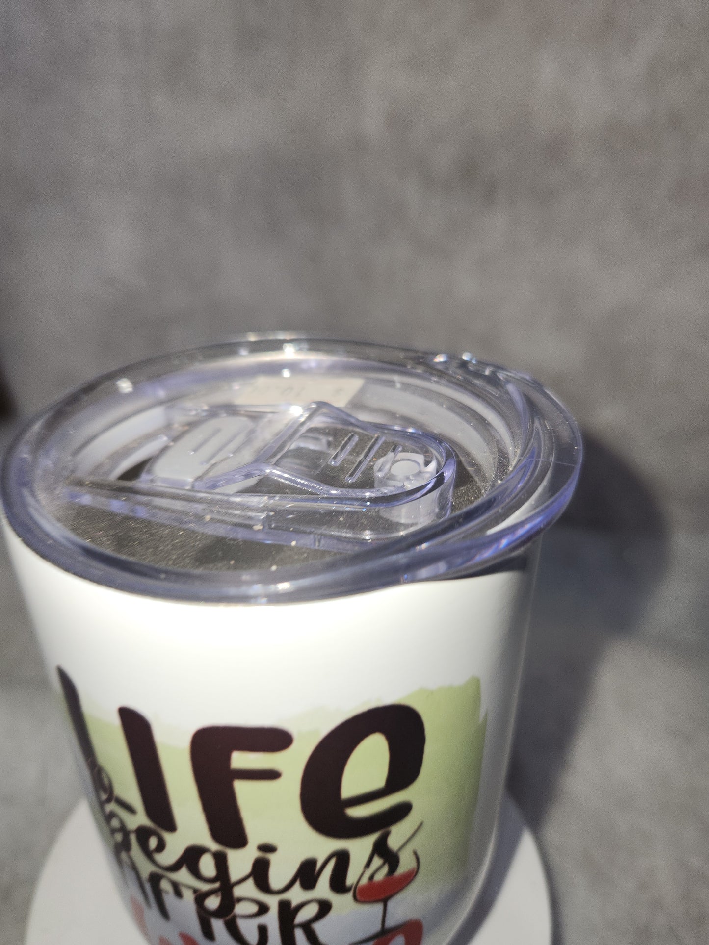 12 Oz stainless steel wine tumbler. It says life begins after wine wt3