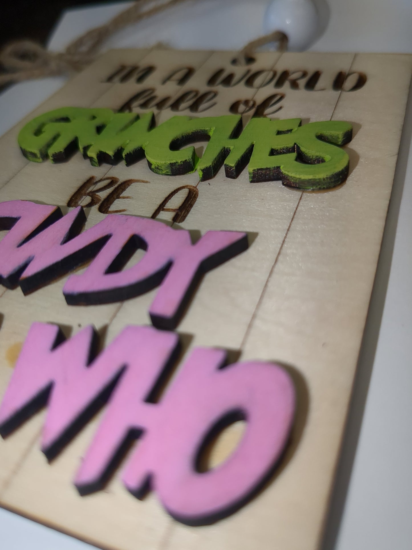 Ornament or car charm In a world of Grinches be a Cindy Lou Who