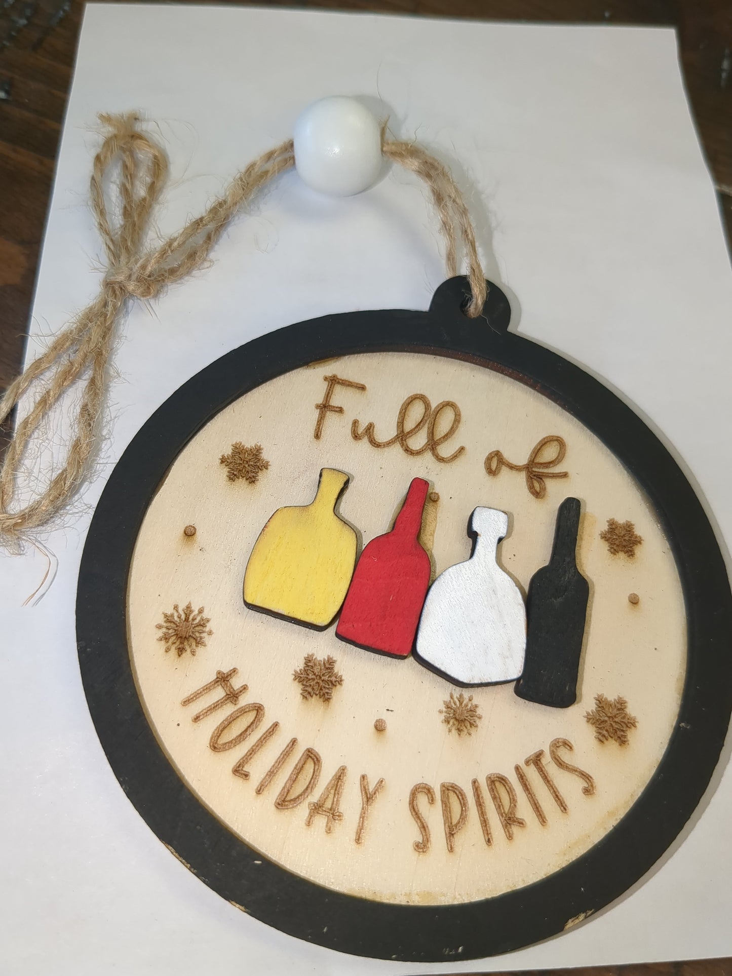 Wooden ornament or car charm. Full of holiday spirits.
