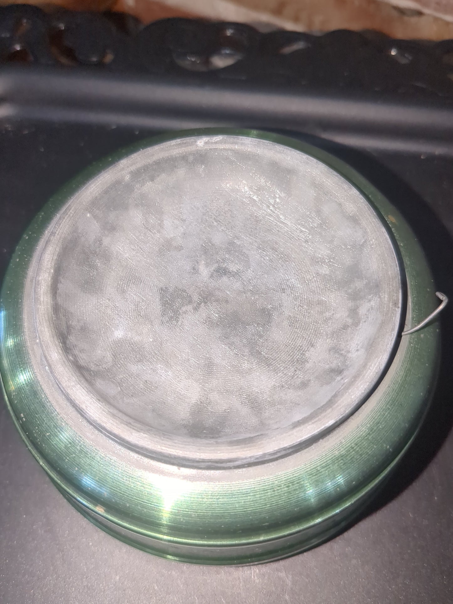 Vintage, round, aluminum, powder puff music box with faux pearls on top. Mb1
