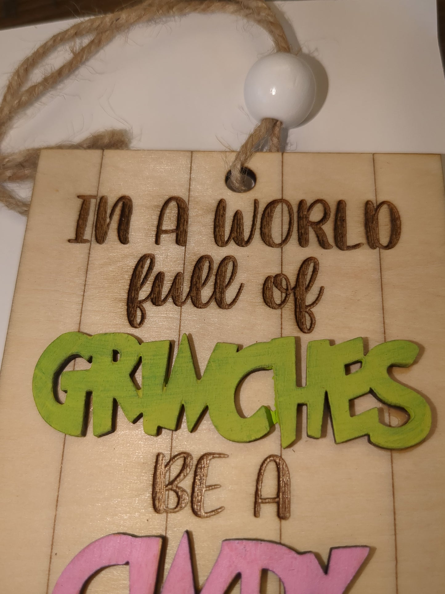 Ornament or car charm In a world of Grinches be a Cindy Lou Who