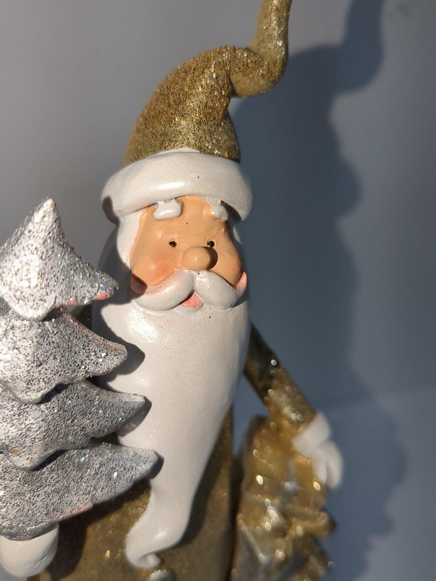 Sags glittery gold silver and white Santa