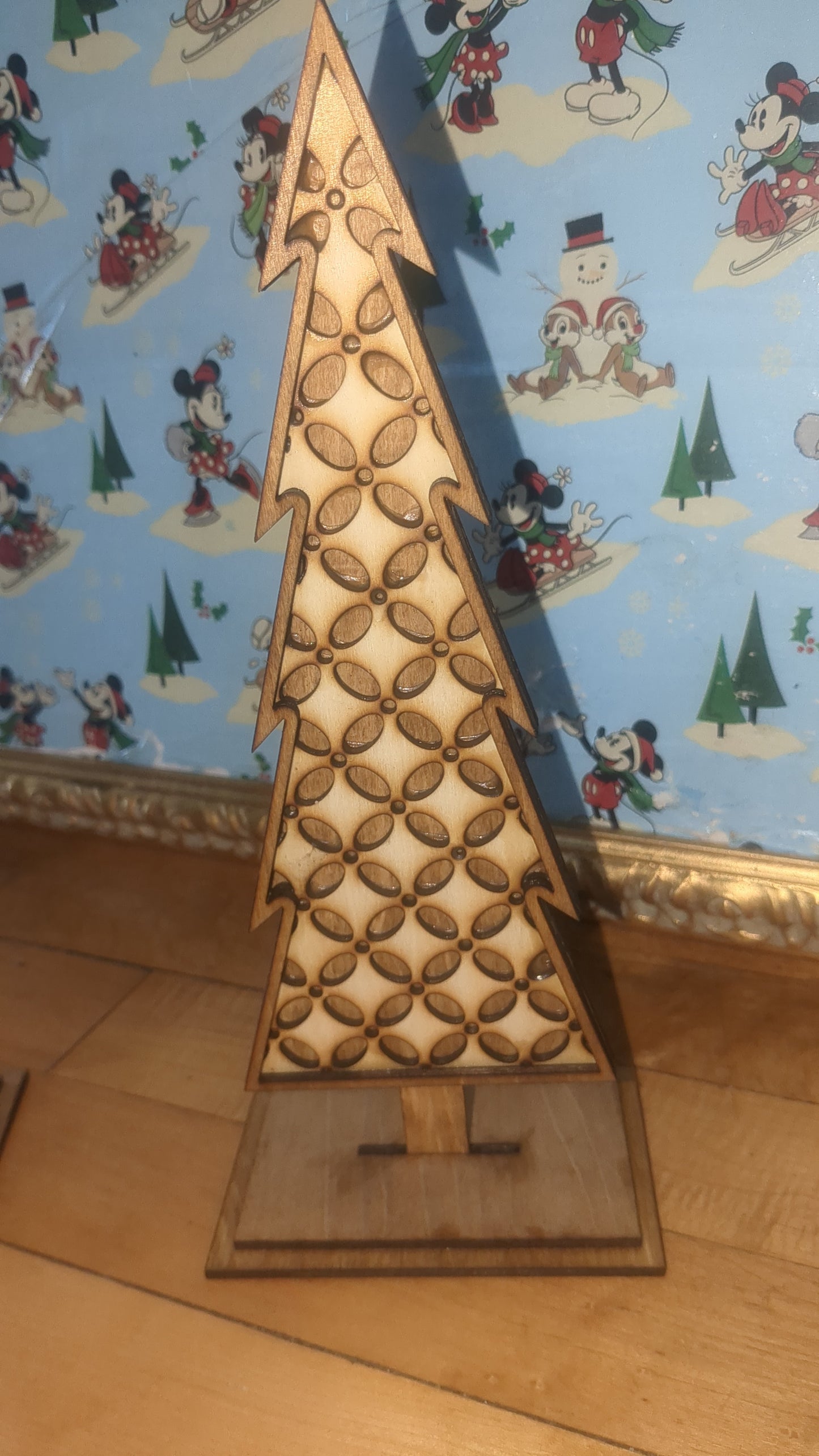 Standing wooden patterned layered trees. Unique decor pieces sold as a set.