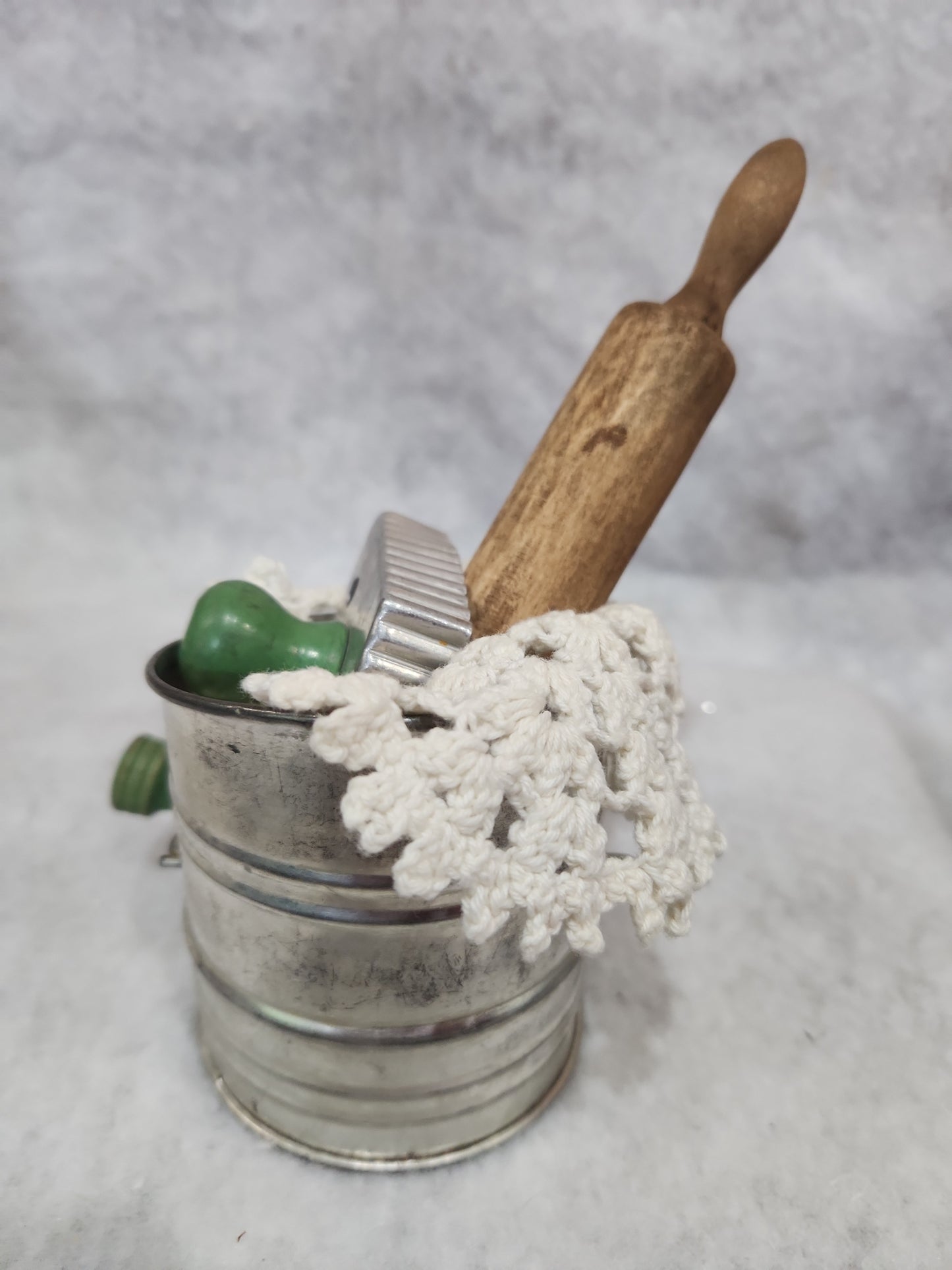 Flour sifter, rolling pin, doily, cookie cutter assemblage asb21