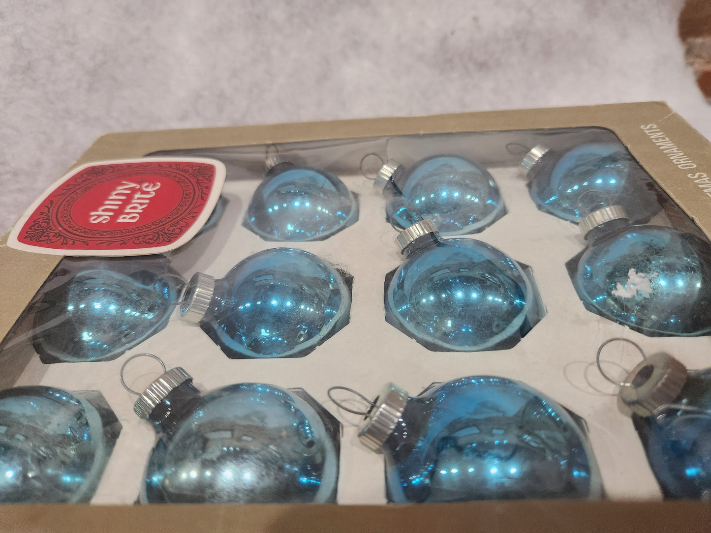 Box of Shiny Brite Brite turquoise ornament 1 1/2" bo61