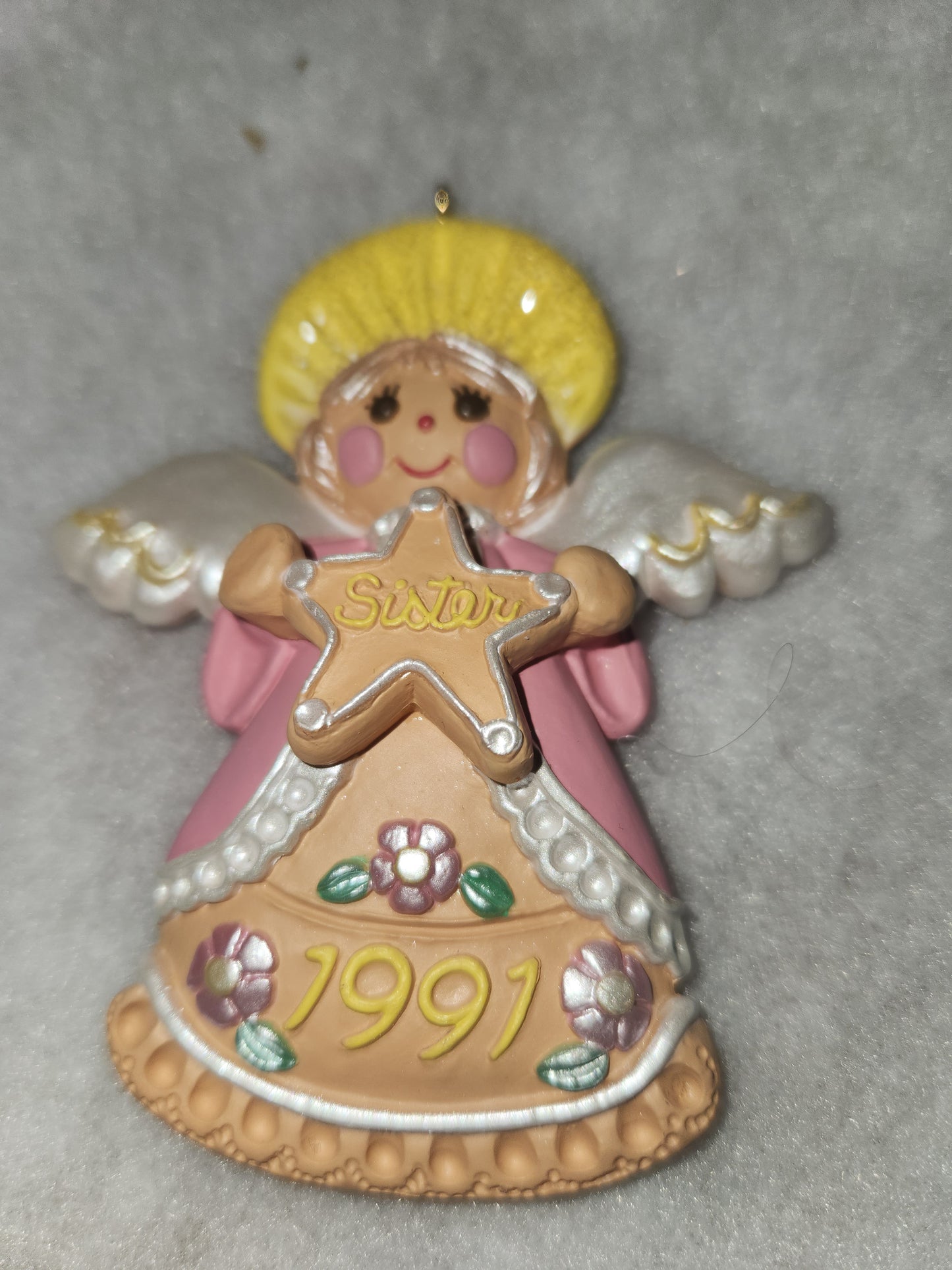 Vintage 1991 Hallmark Keepsake ornament Angel Holding gingerbread star Sister written on it ho92