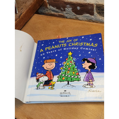 The Joy of A Peanuts Christmas 50 Years of Holiday Comics Schulz Hallmark bk01