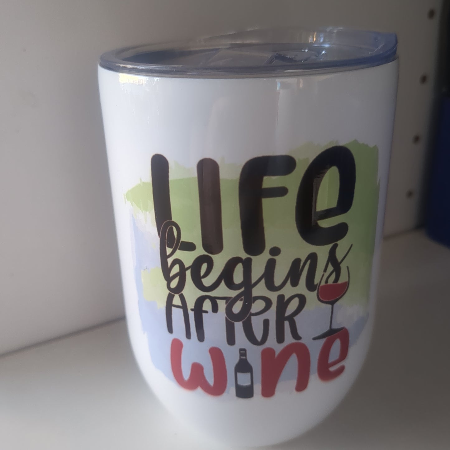 12 Oz stainless steel wine tumbler. It says life begins after wine