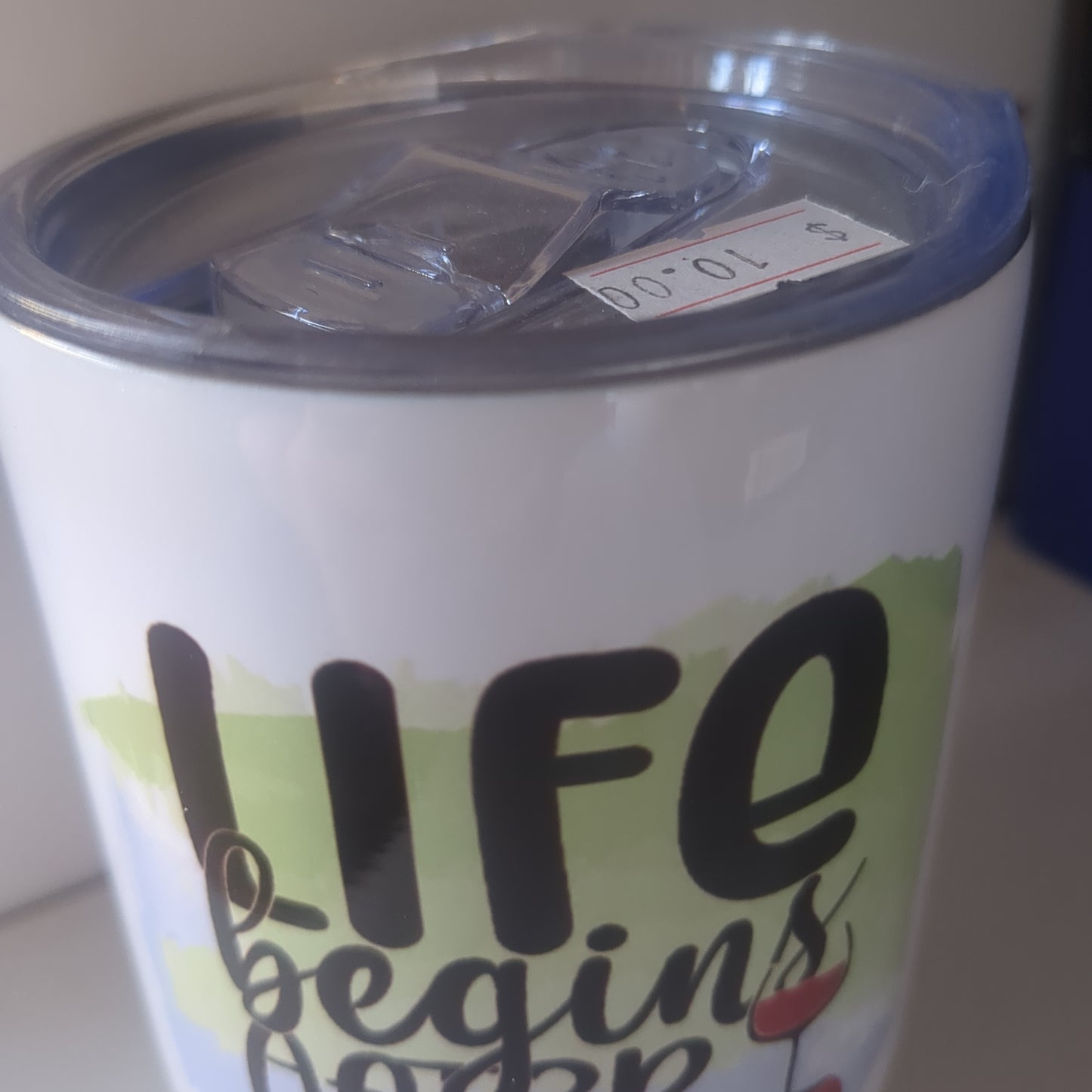 12 Oz stainless steel wine tumbler. It says life begins after wine