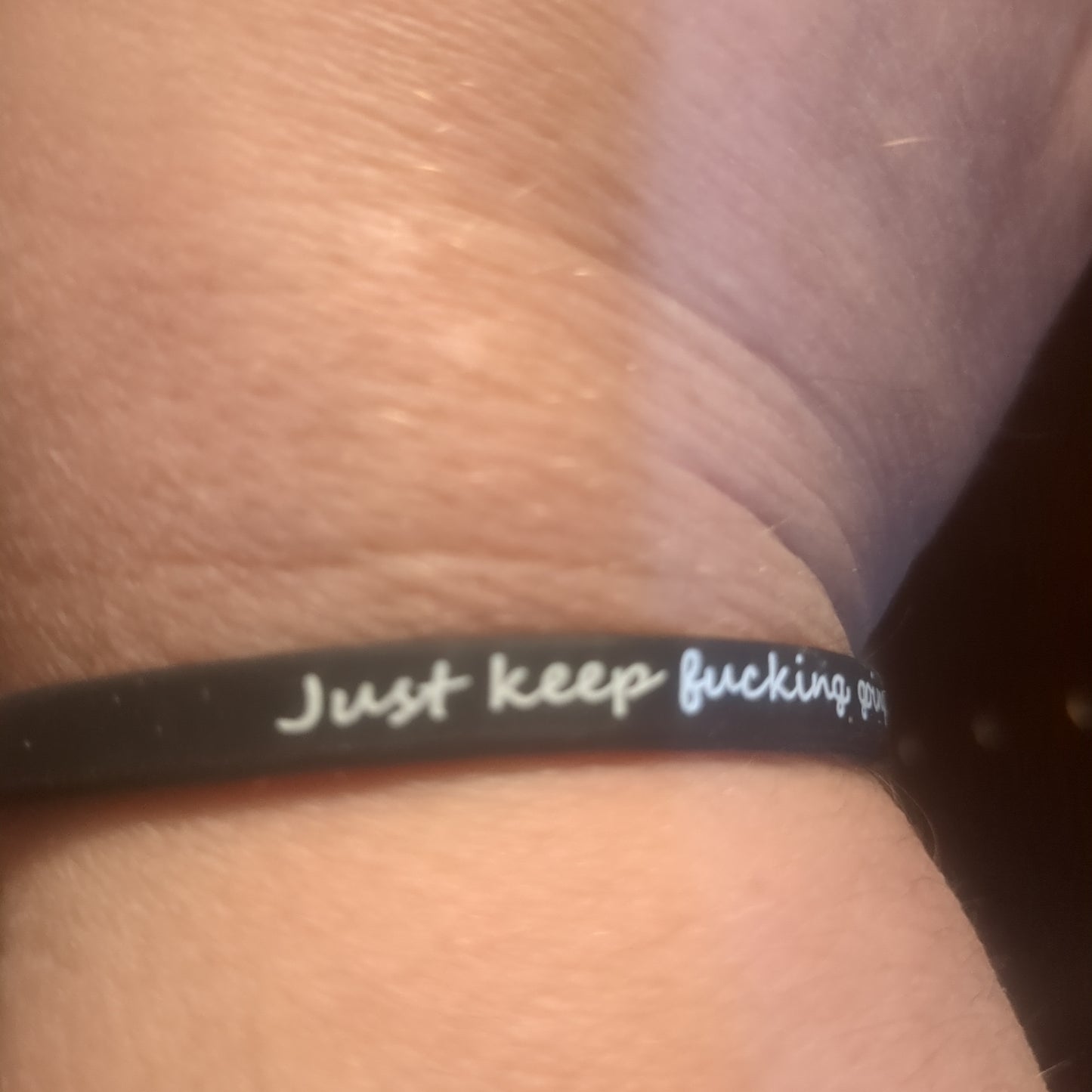 Caution x-rated black silicone bracelet for encouragement says just keep going