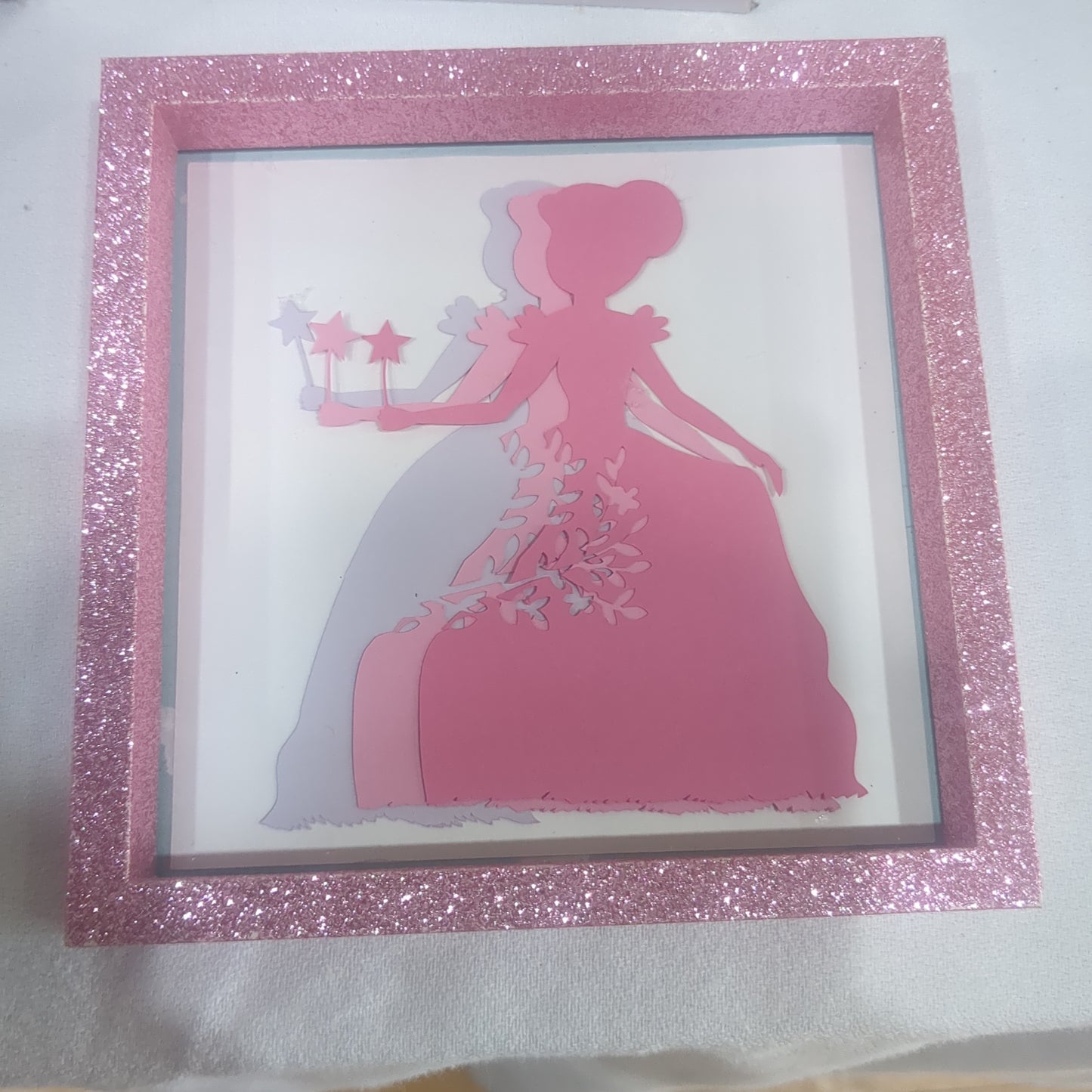 5 1/2 x 5 1/2” pink shadowbox with paper cut princess