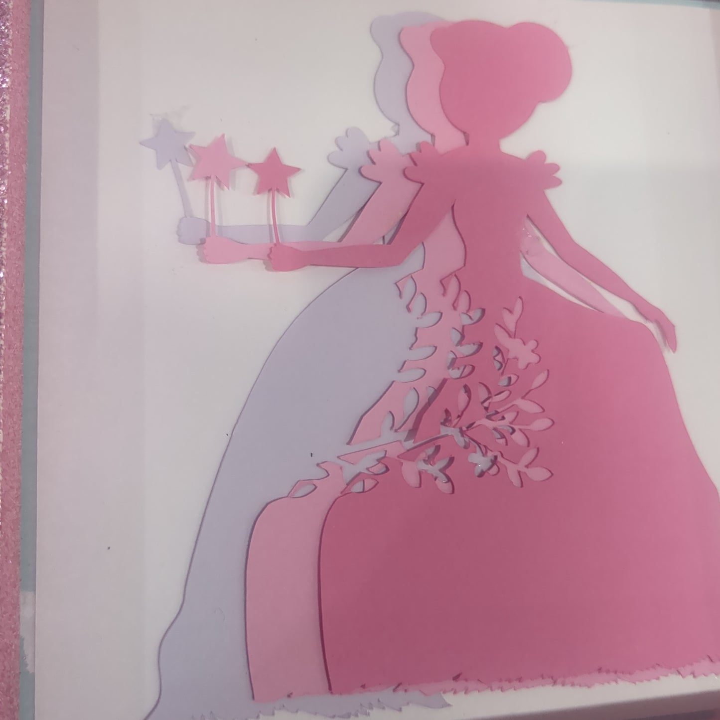 5 1/2 x 5 1/2” pink shadowbox with paper cut princess