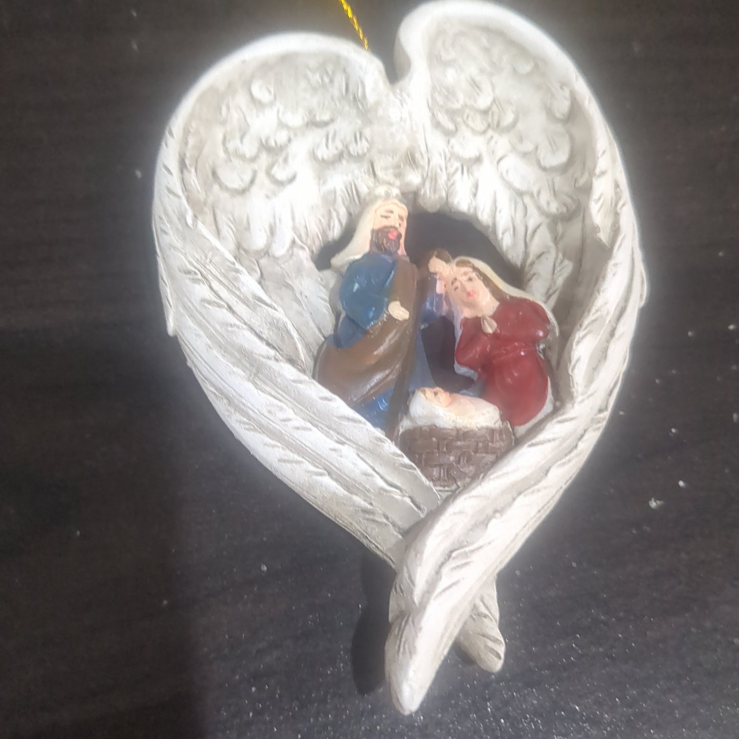 Holy Family, nativity scene in angels wings