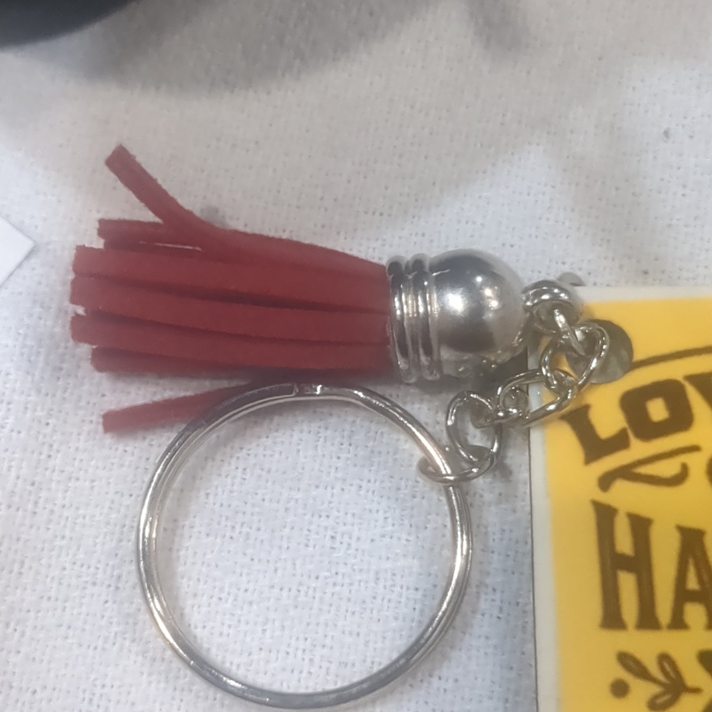 Keychain love me or hate me I'm still gonna shine