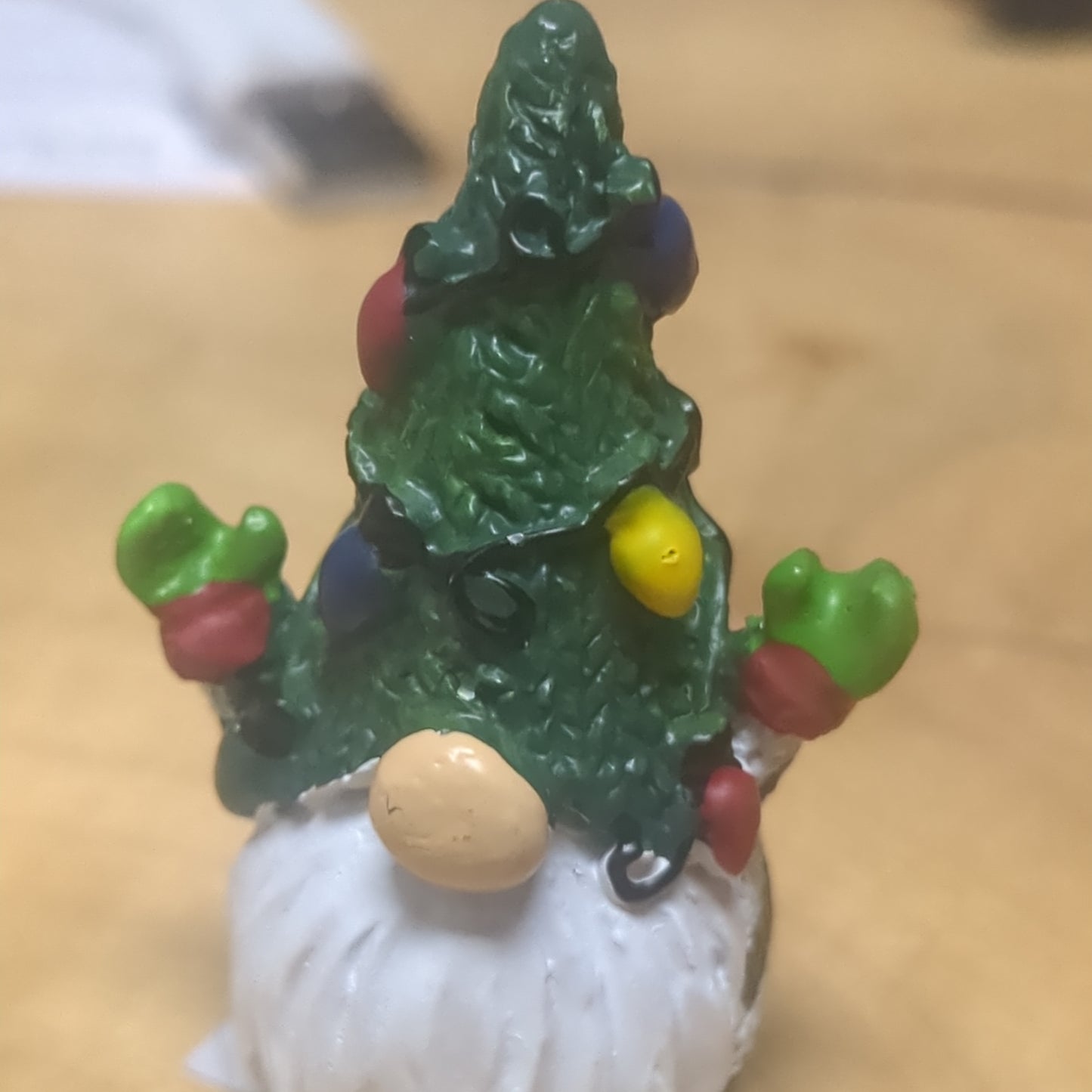 Gnome pocket charm with green hat.