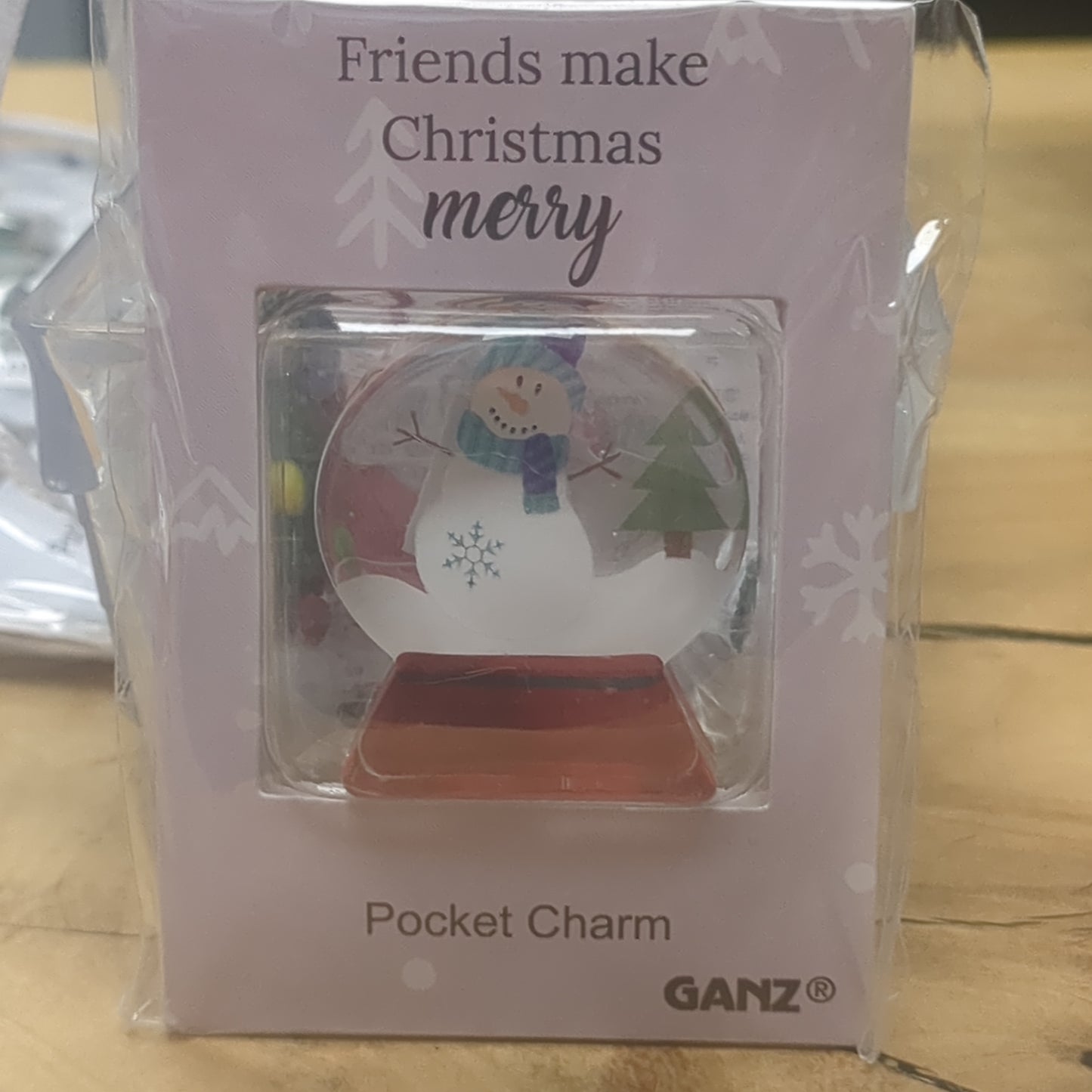 Pocket charm snow globe appearance with snowman inside. friends Make Christmas Merry
