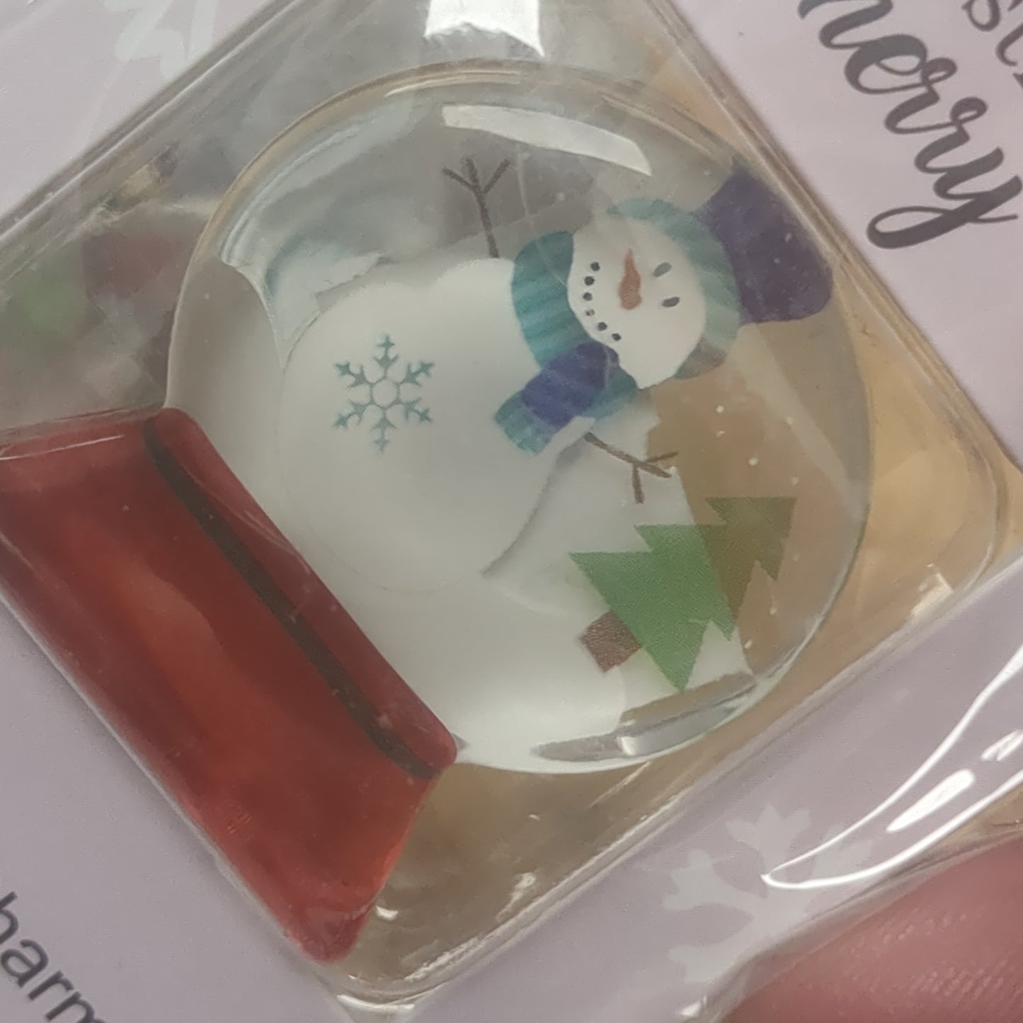 Pocket charm snow globe appearance with snowman inside. friends Make Christmas Merry