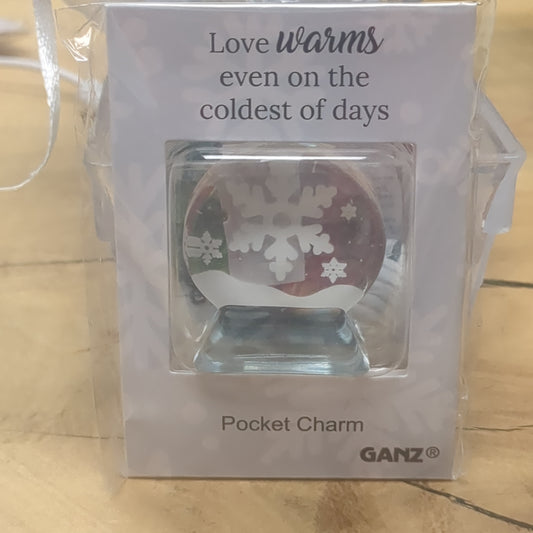 Pocket charm snow globe appearance with snowflake inside. Love warms even on the coldest of days