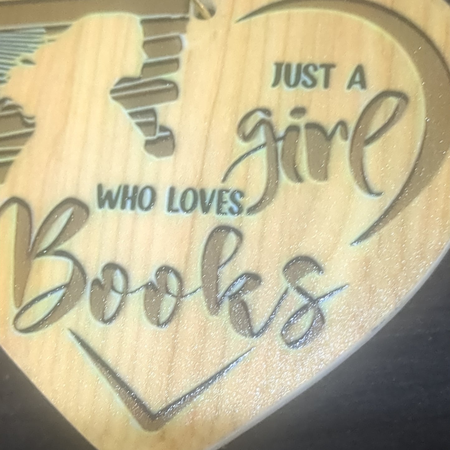 Heart-shaped ornament just a girl who loves books