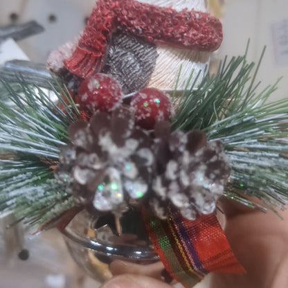 Bird on bell ornament