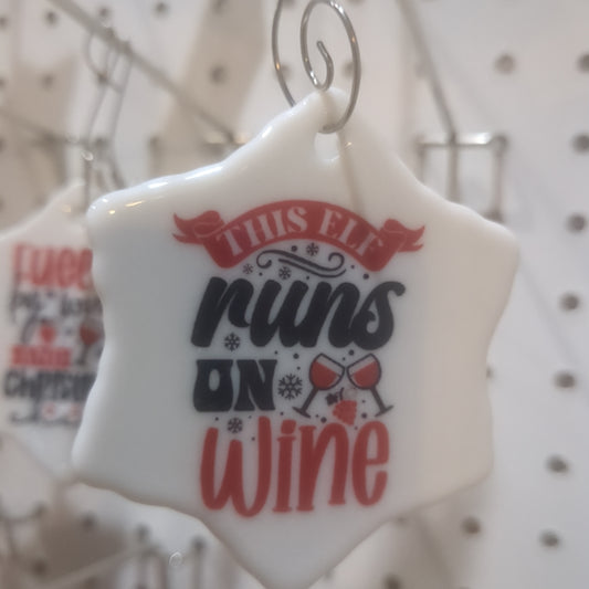 Ceramic wine ornament. This elf runs on wine.