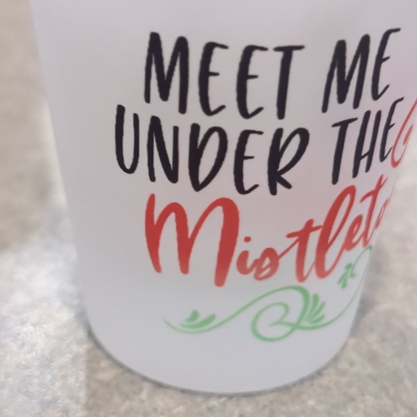 Frosted glass shot glass.  Meet me under the mistletoe