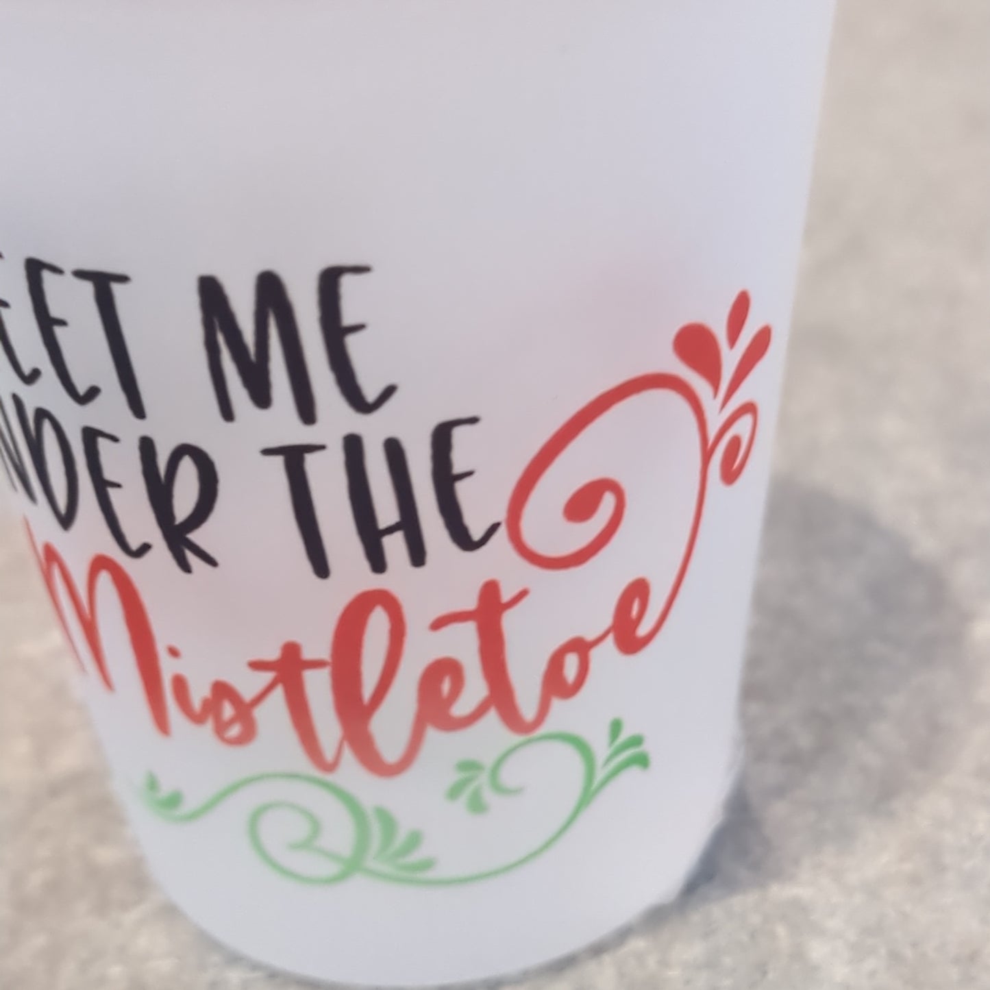 Frosted glass shot glass.  Meet me under the mistletoe