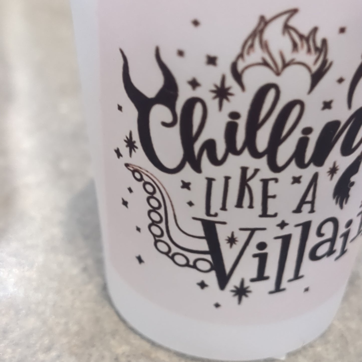 Frosted glass shot glass.  Chilling like a villain