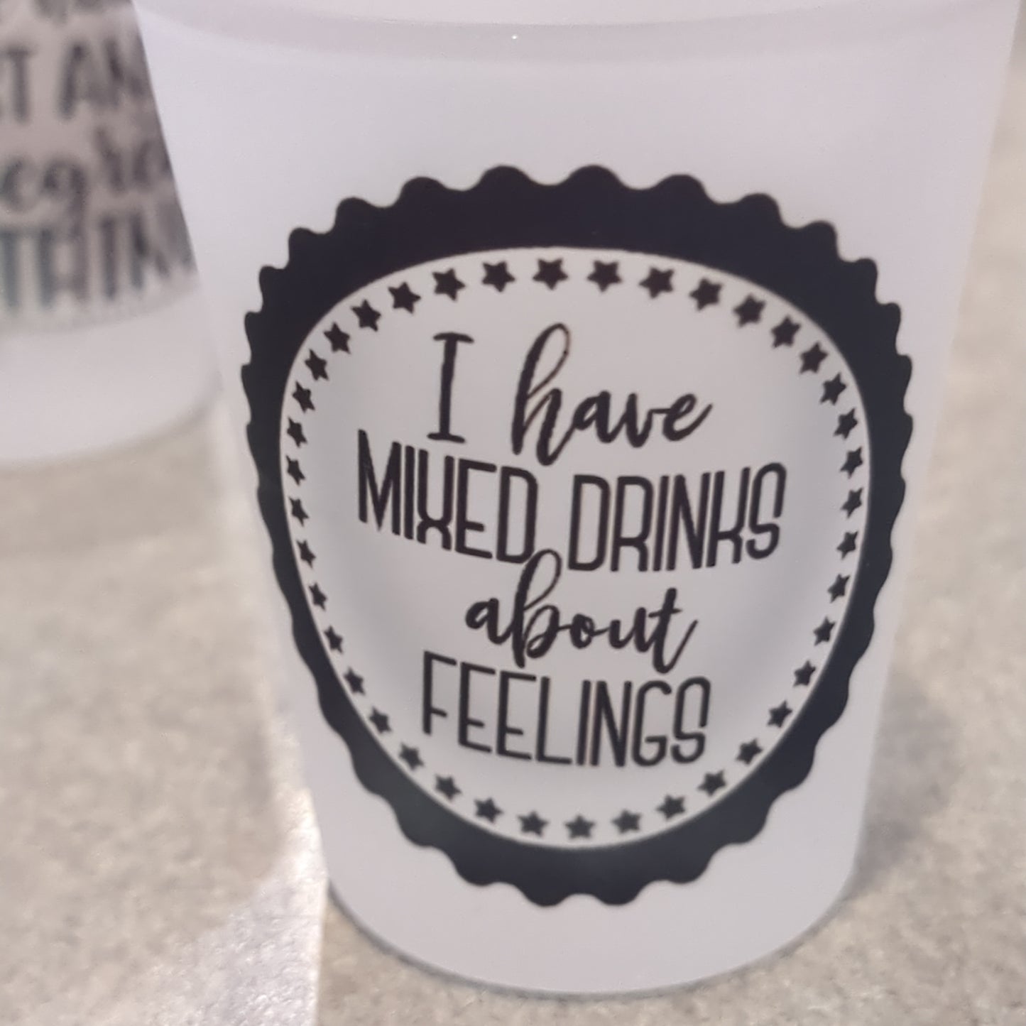 Imperfect Frosted glass shot glass. I have mixed drinks about feelings.