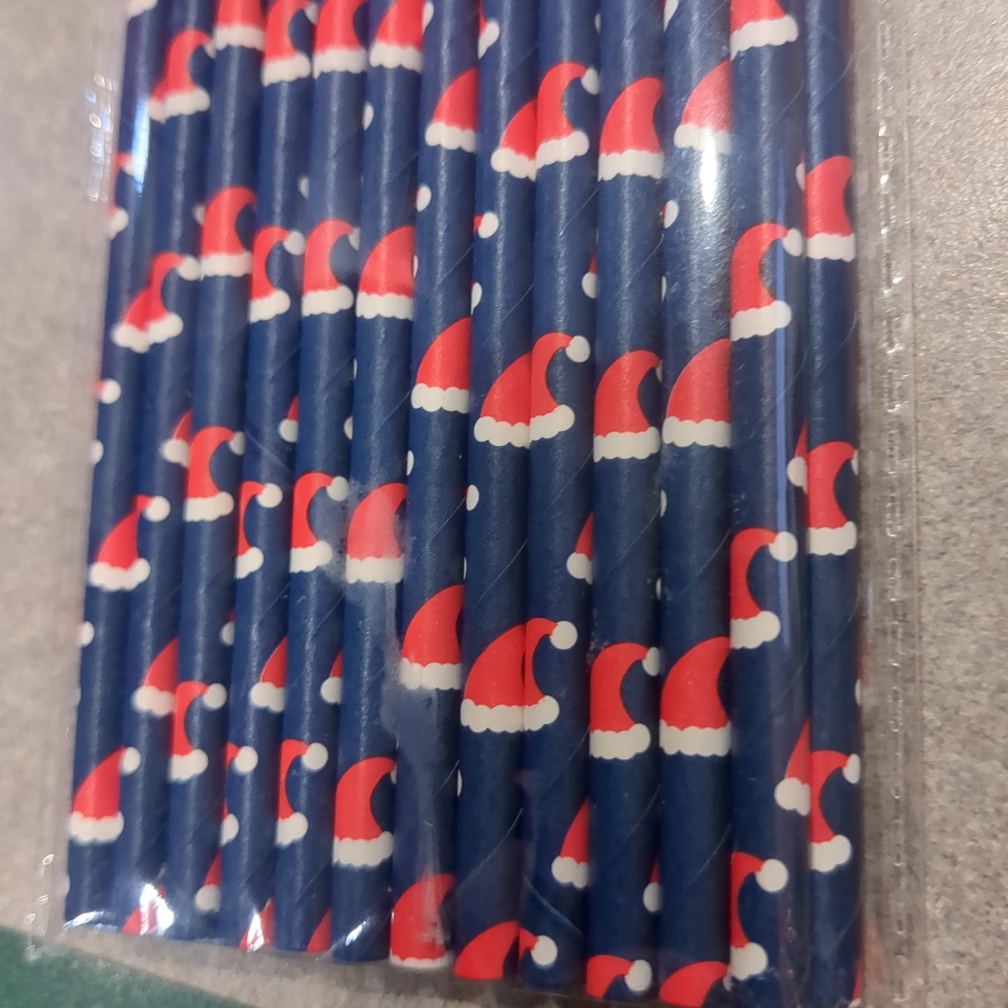 25 navy blue paper drinking straws with Santa hats