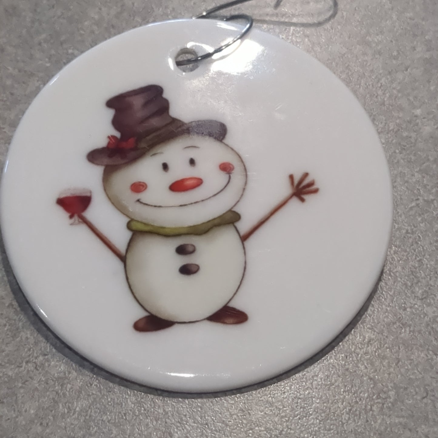 Ceramic ornament snowman with a wine glass