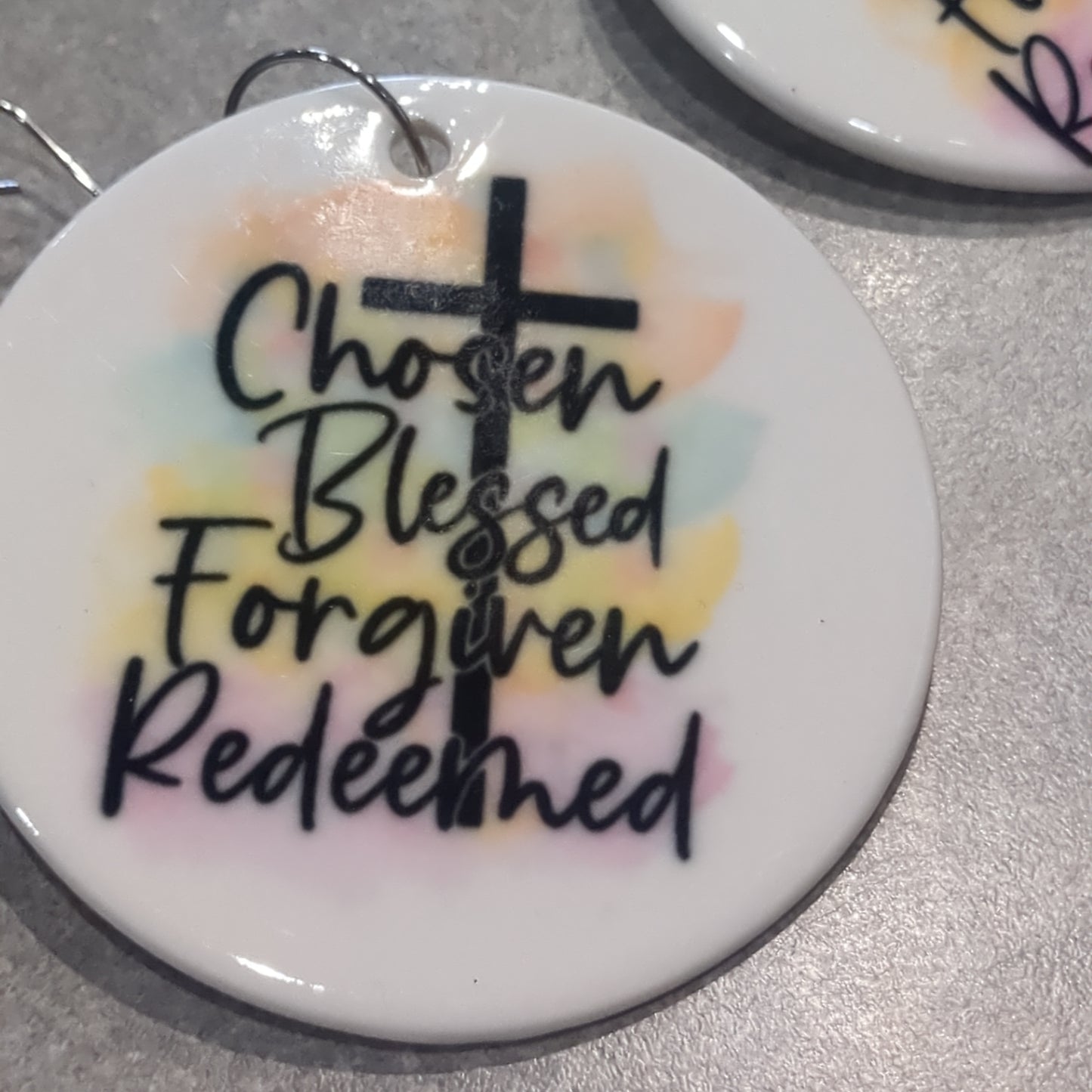 Ceramic ornament with a cross chosen blessed forgiven reading