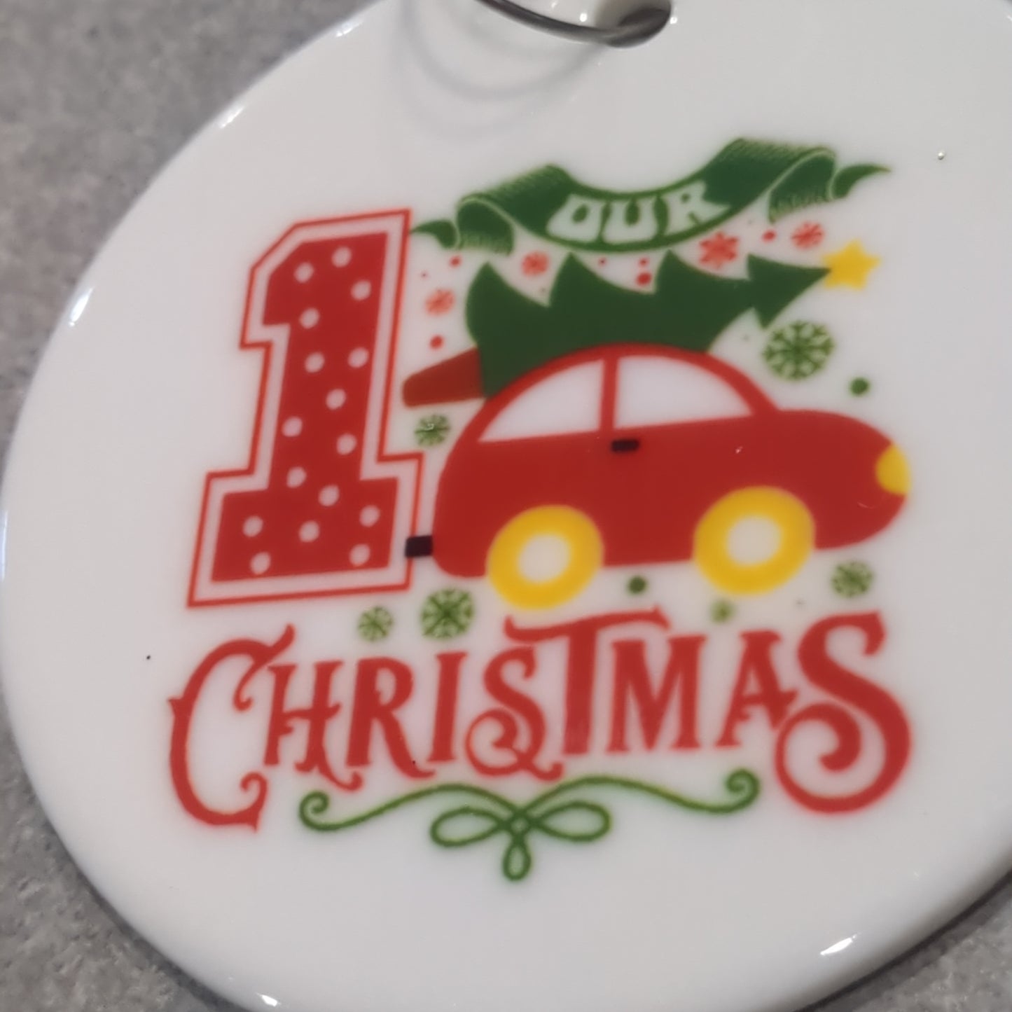 Ceramic ornament our first Christmas with a car with a tree tied on top