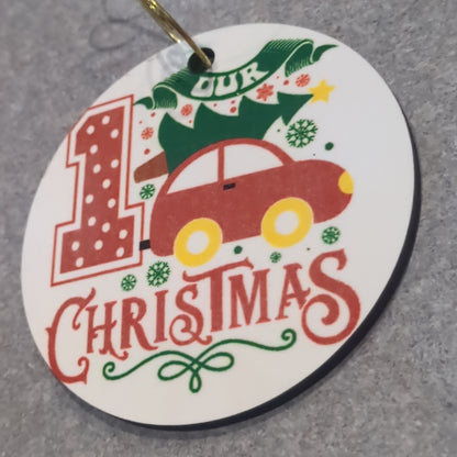 MDF ornament our first Christmas with a tree tied to the top of the car