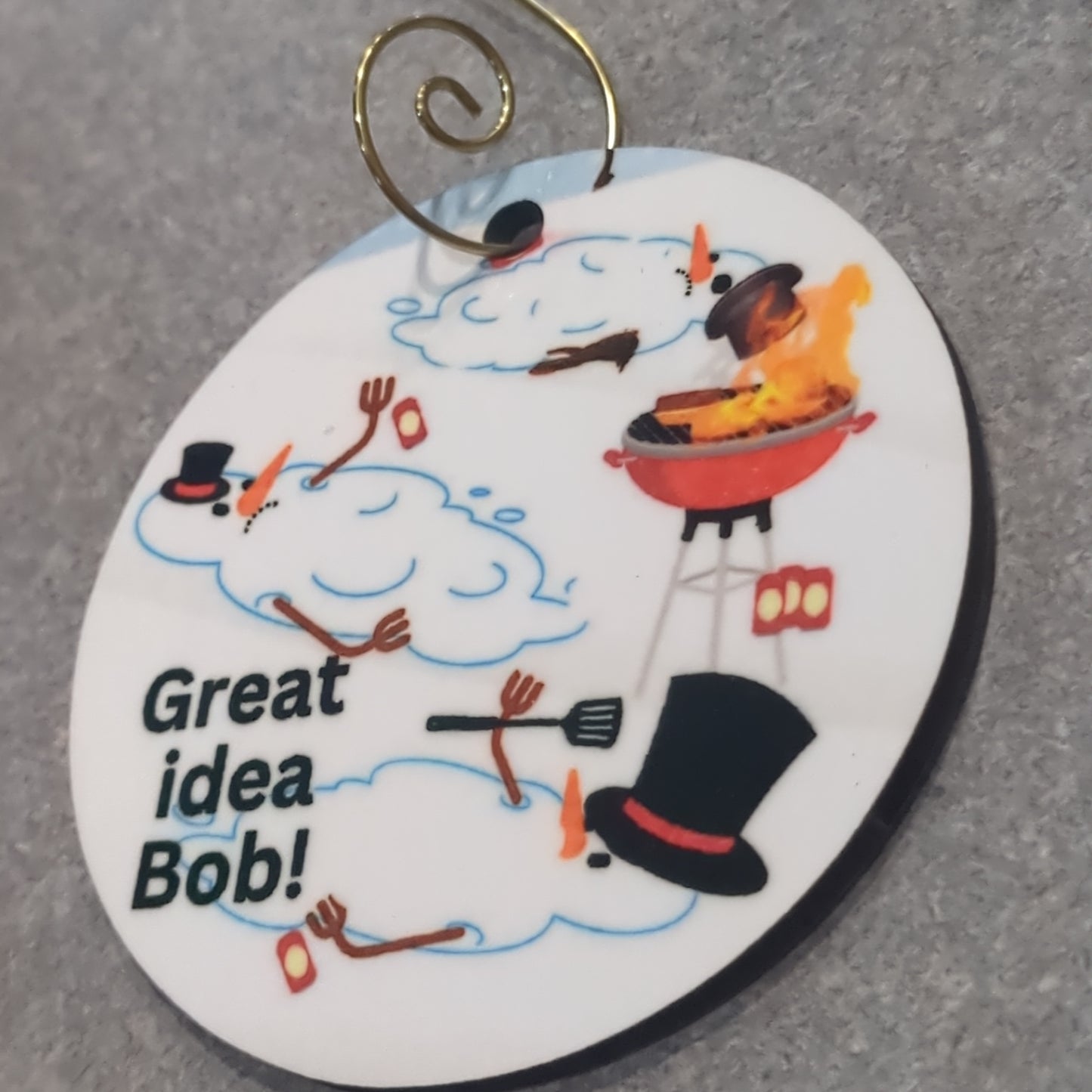 MDF ornament three snowmen melted around a grill and the words great idea Bob!