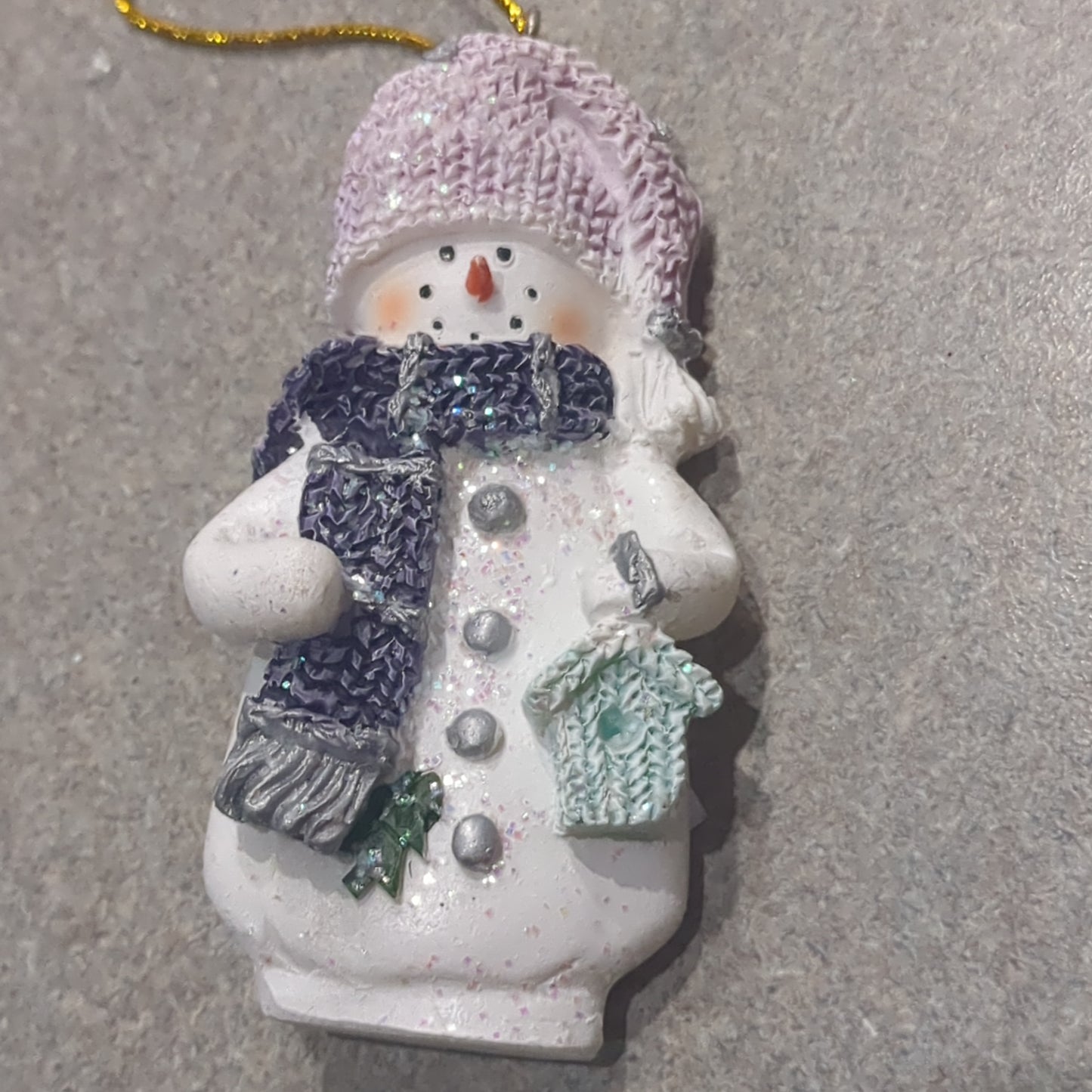 Polycrylic snowman ornament with a birdhouse lilac and purple