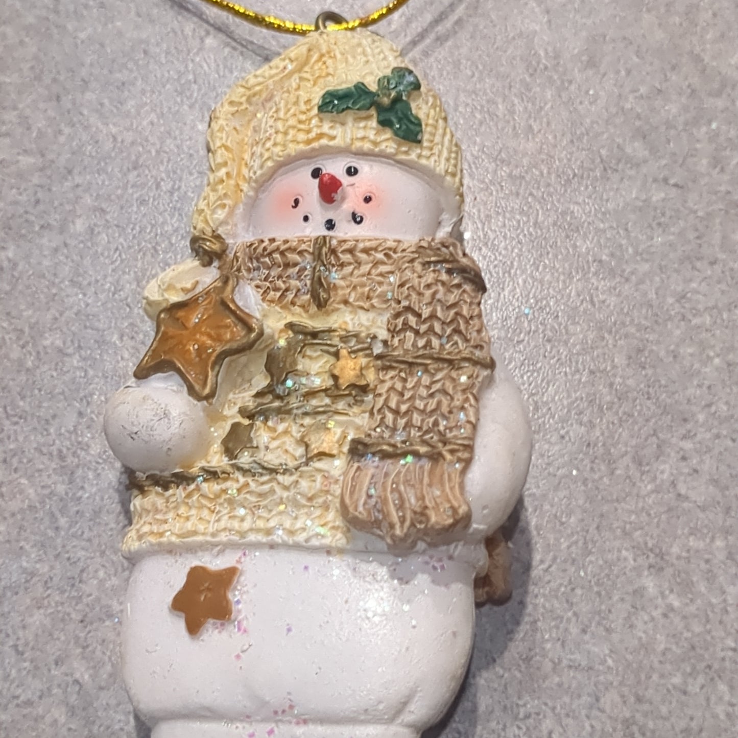Polycrylic snowman ornament with star yellow