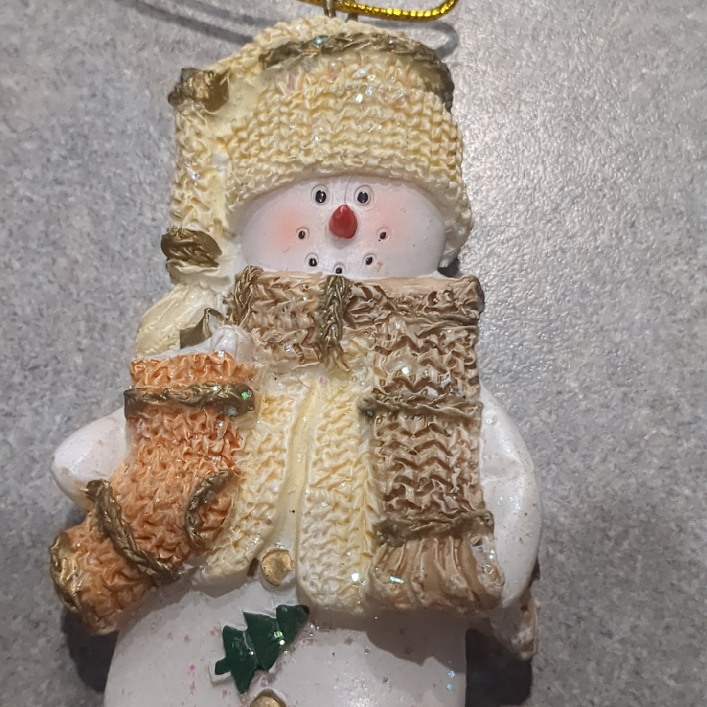 Polycrylic snowman ornament with stocking yellow