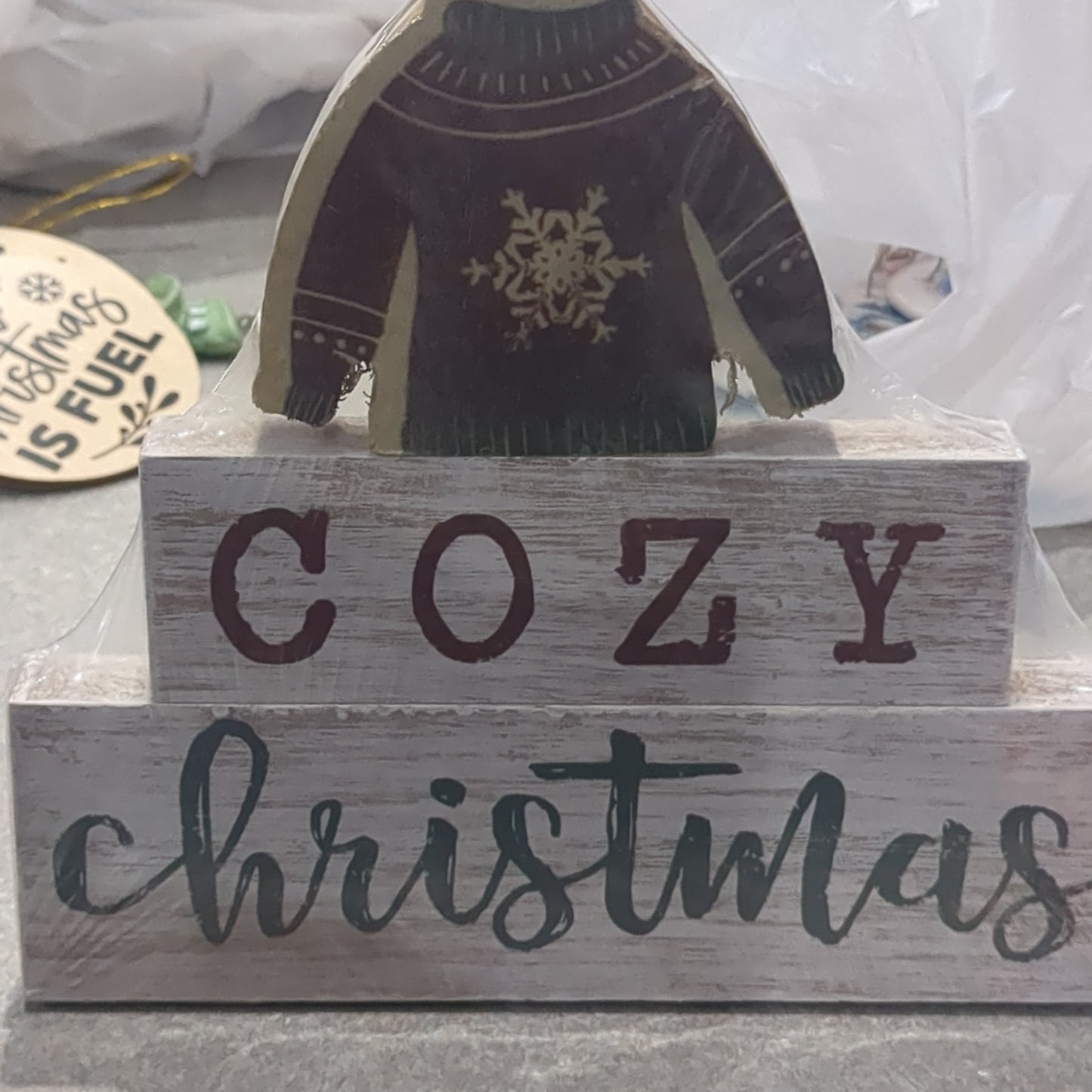 Cozy Christmas sign with a sweater