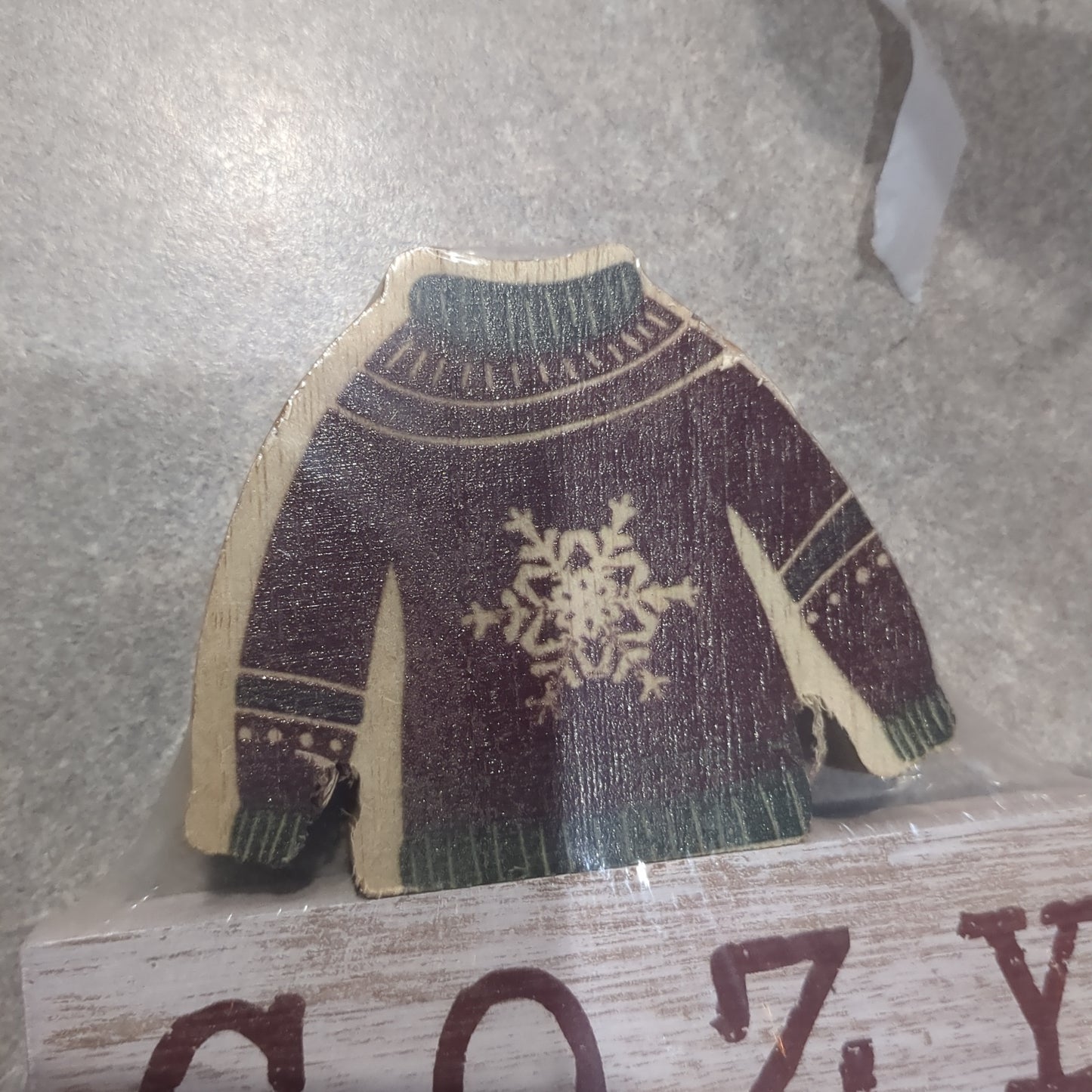 Cozy Christmas sign with a sweater