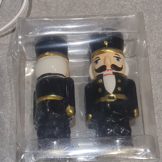 Damaged Salt and pepper shakers nutcracker black and gold