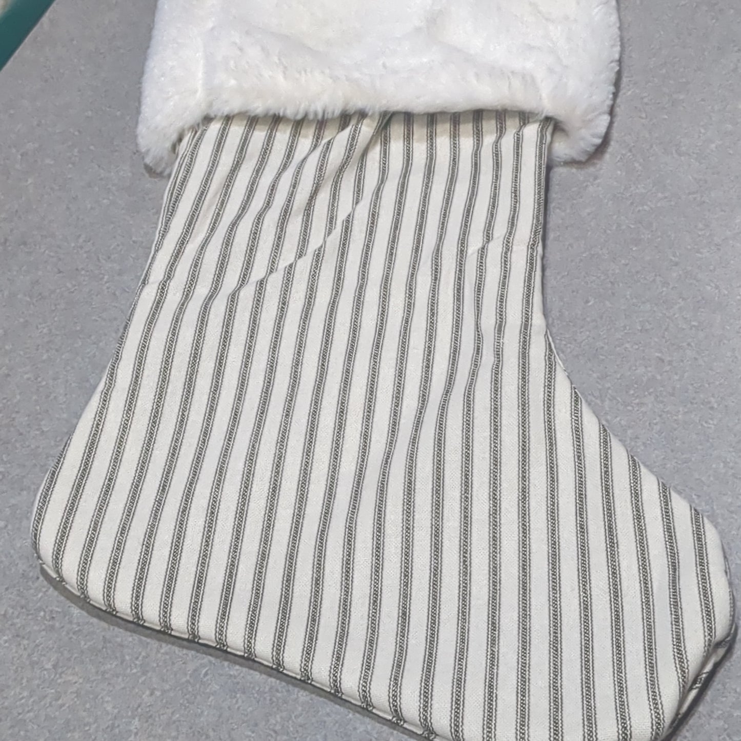 Stocking white with grey stripes.  Fuzzy white upper cufft