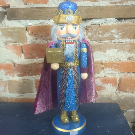 Nutcracker with plum robe, crown and chest