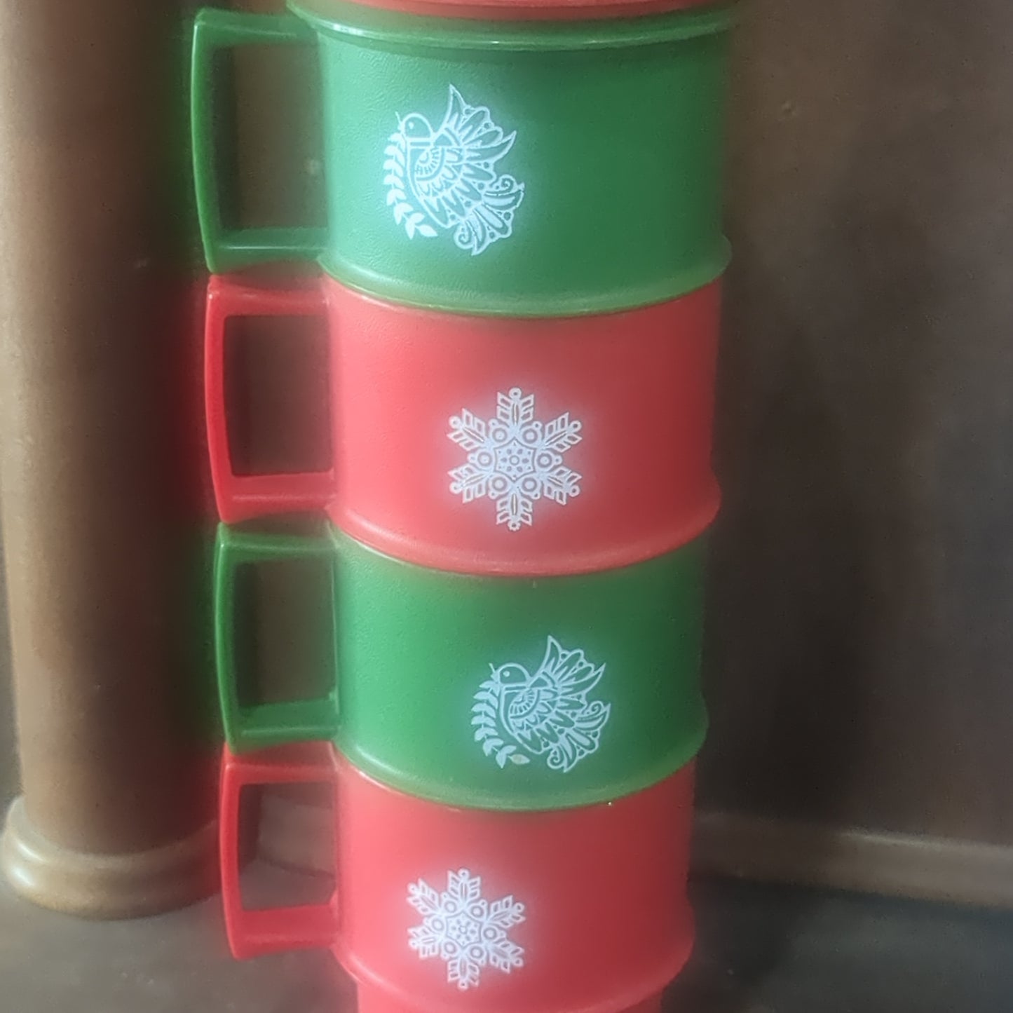 4 Tupperware holiday cups with saucers