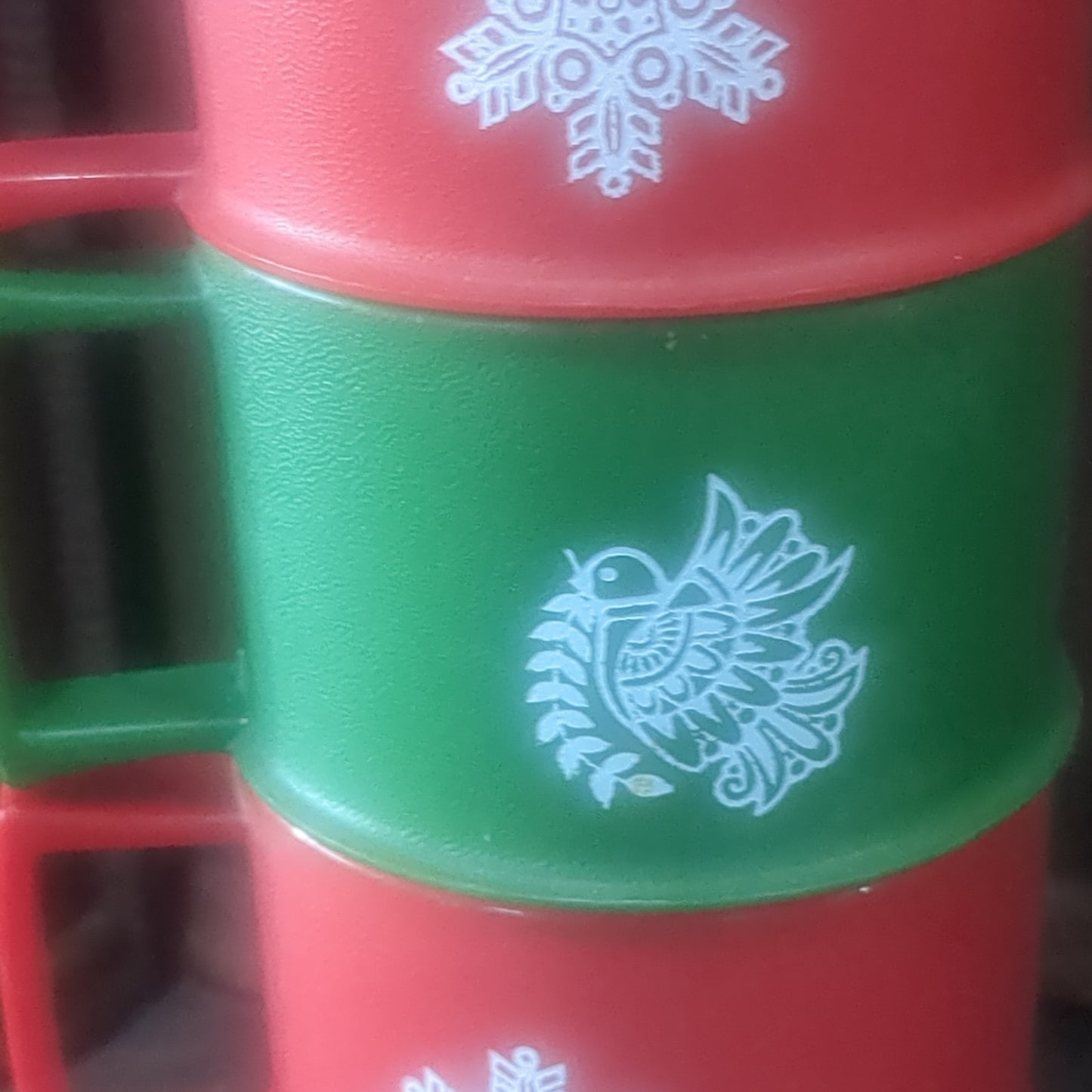 4 Tupperware holiday cups with saucers