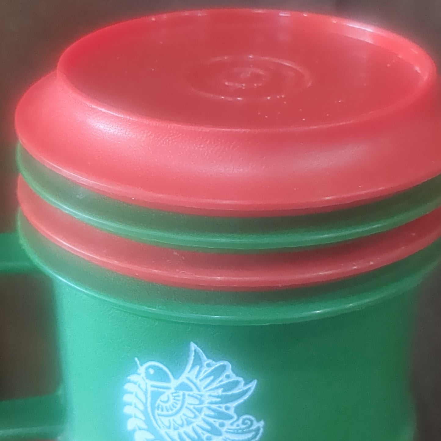 4 Tupperware holiday cups with saucers