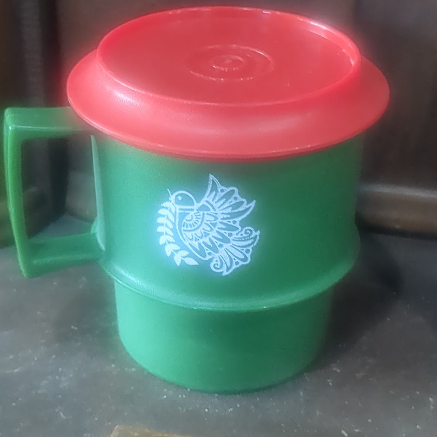 4 Tupperware holiday cups with saucers